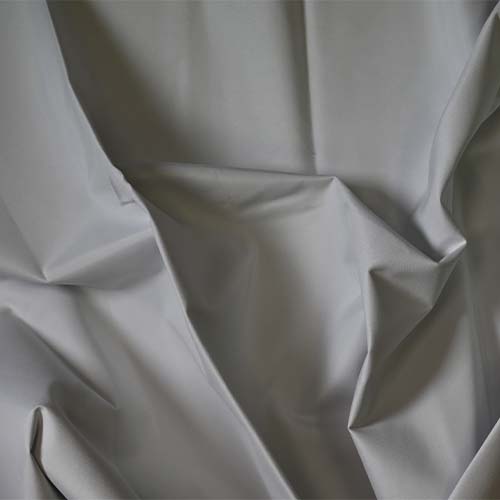 Close-up of greige Lining curtain fabric.