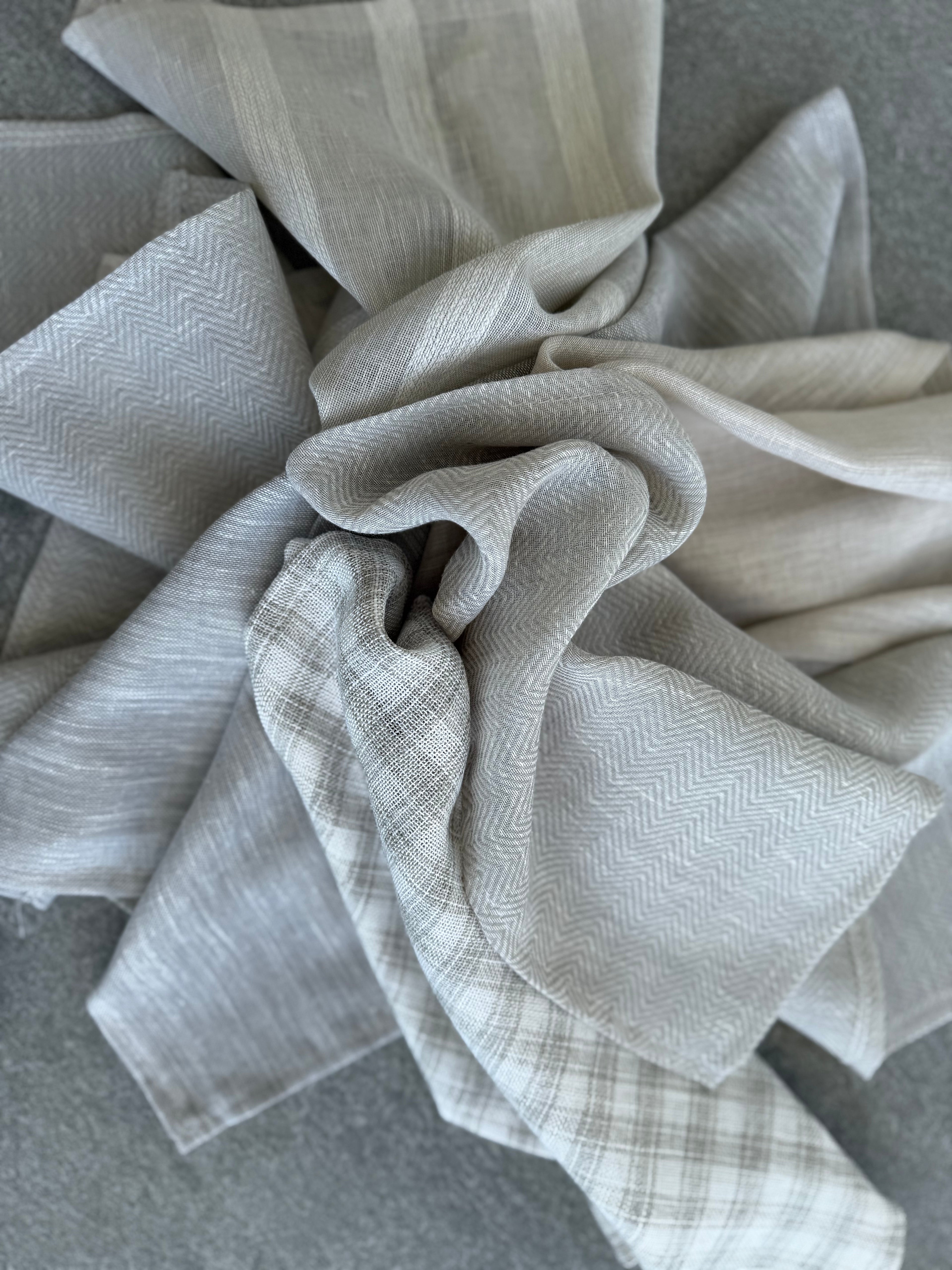 Various samples of fabrics from Design Curtains, which are found in the Sample Kit, displayed in a flower-like arrangement.
