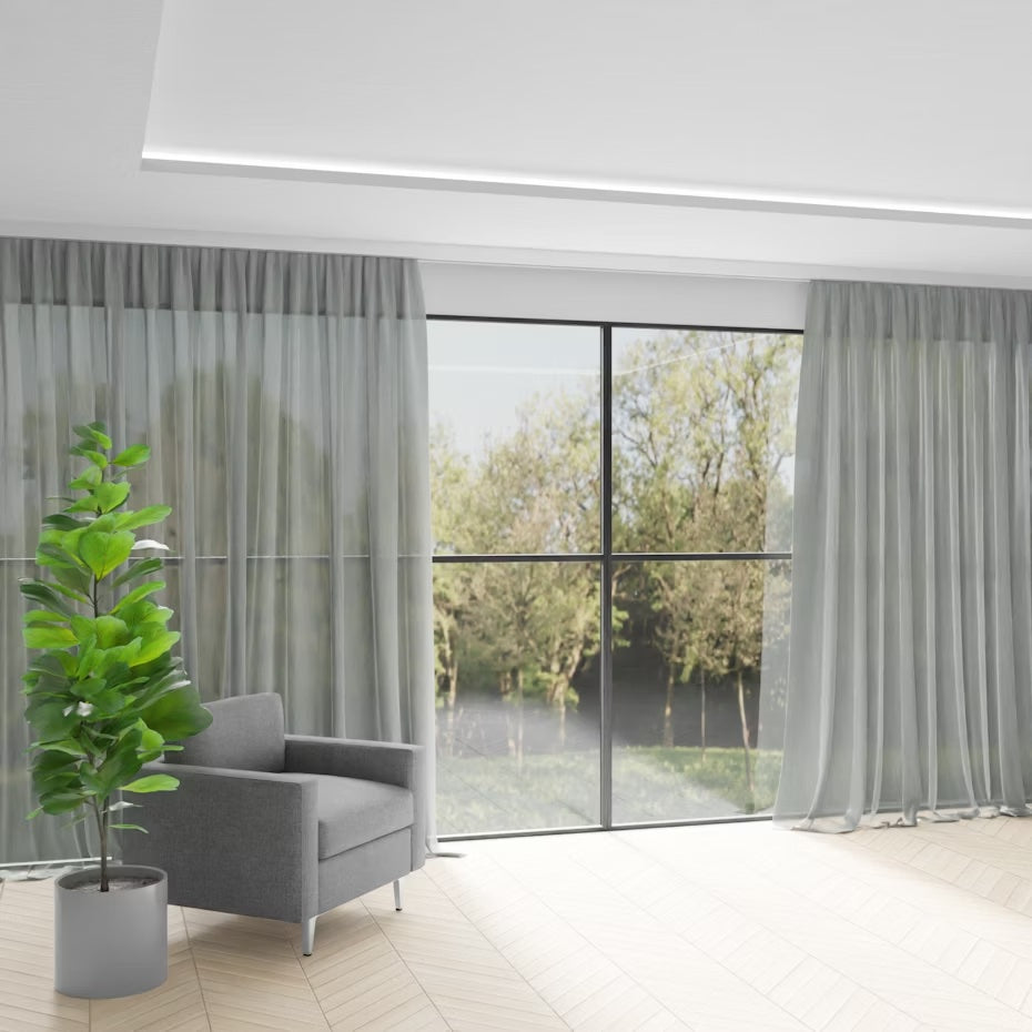 Villa clover semi-transparent curtains displayed in an open living area of a home.